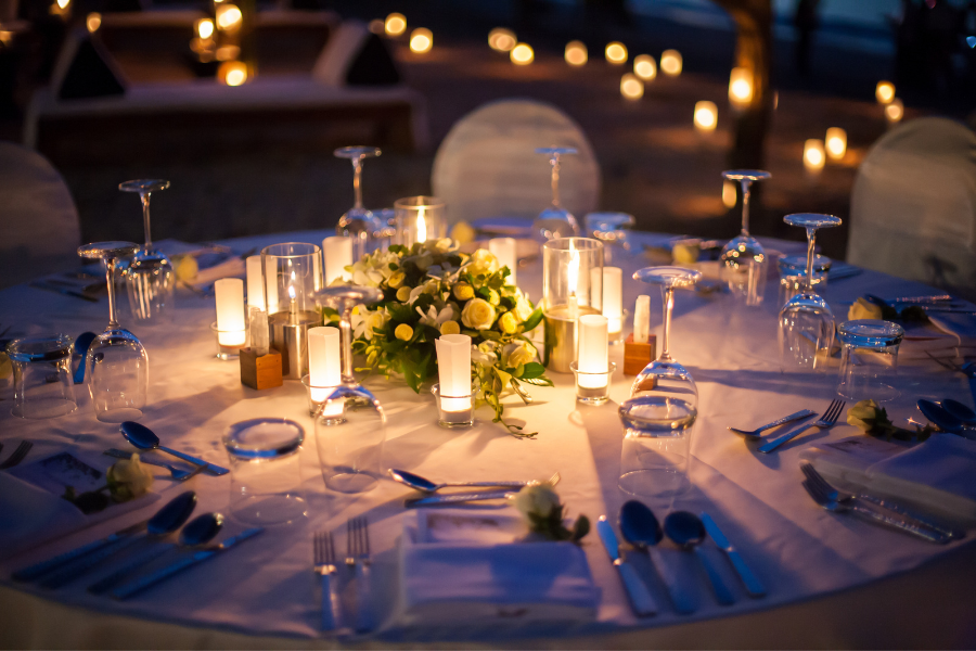 Candlelit evening reception setting